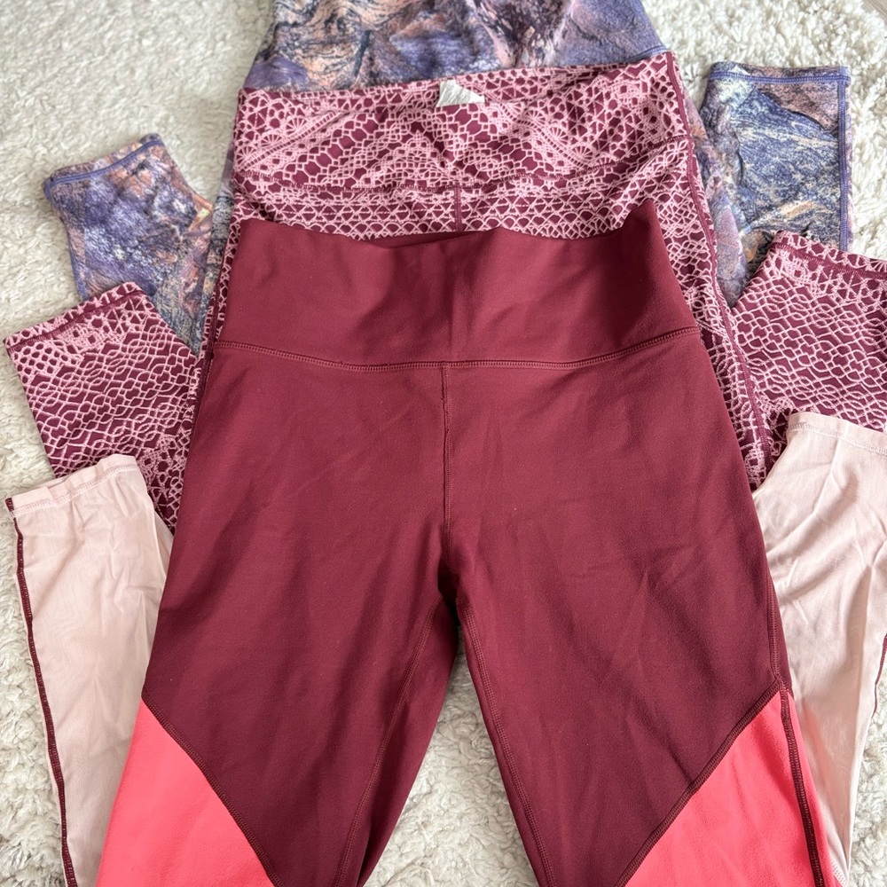 (3) Stylish Fabletics Women's multicolor leggings - size Medium